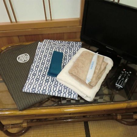 Отель Onsen Minshuku Sakaeya Shizukuishi Экстерьер фото
