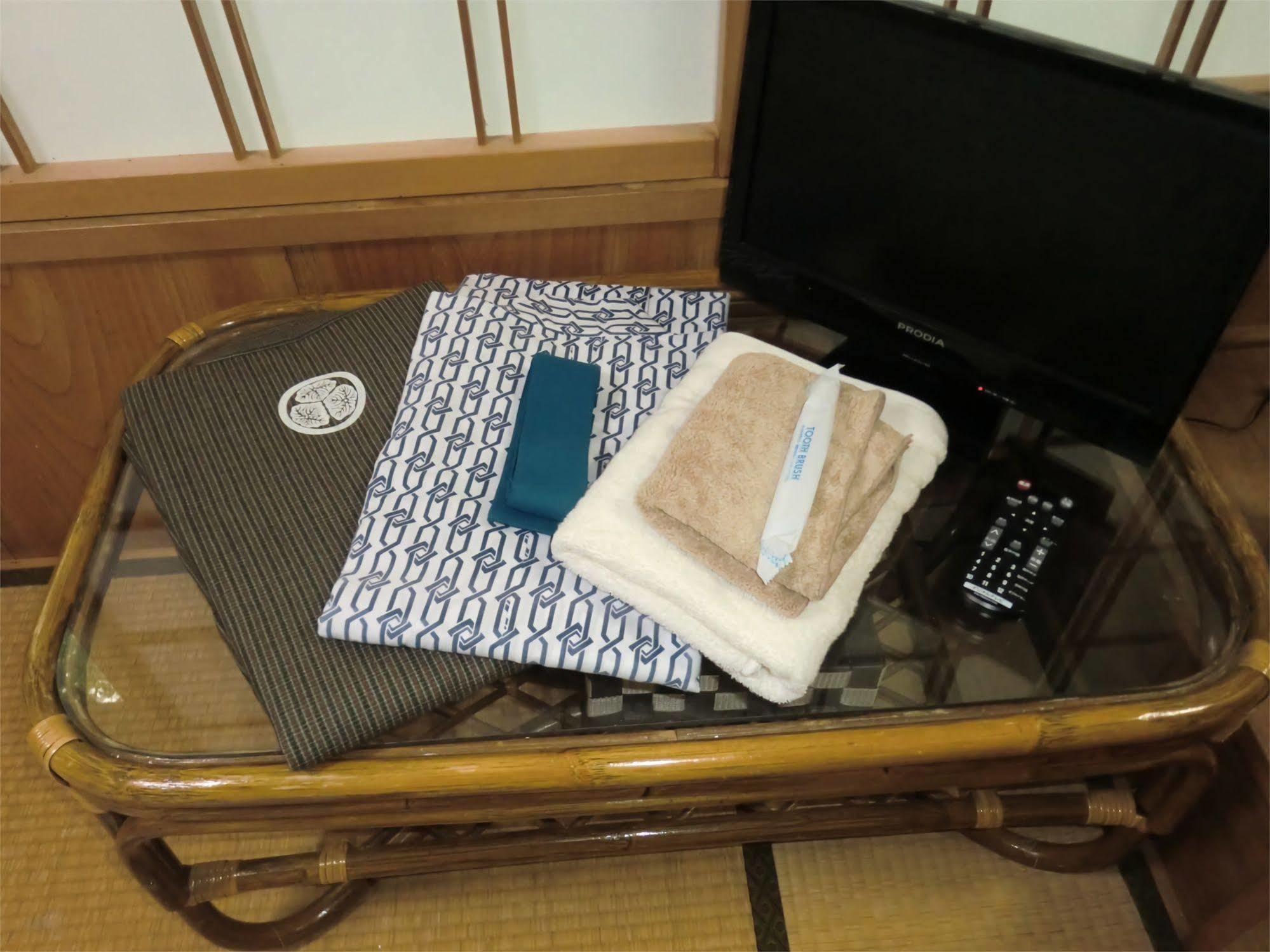 Отель Onsen Minshuku Sakaeya Shizukuishi Экстерьер фото